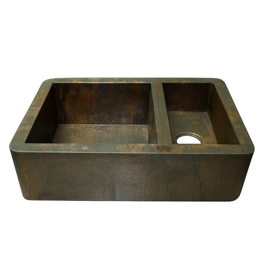 Front view of a custom apron copper kitchen sink with larger left bowl and smaller right bowl
