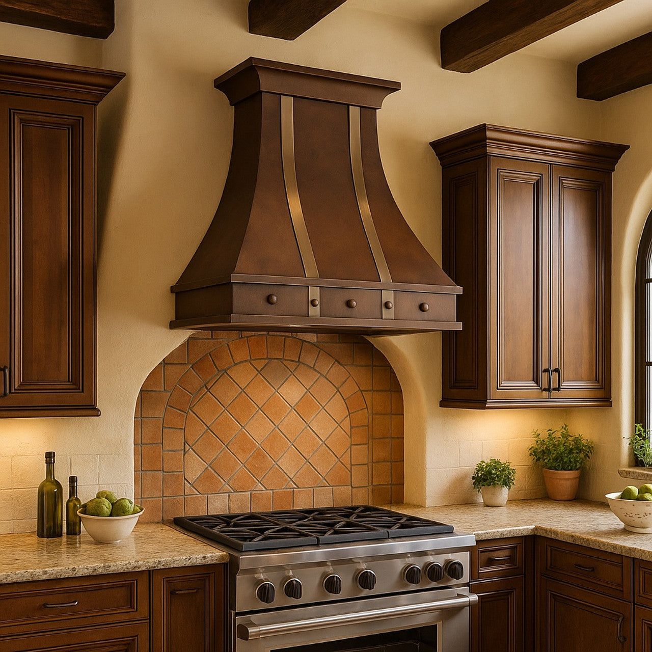 Decorative copper range hood with metal straps in a Spanish revival kitchen