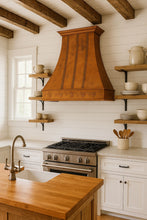Made-to-order farmhouse copper kitchen hood with grapevine in a rustic style kitchen