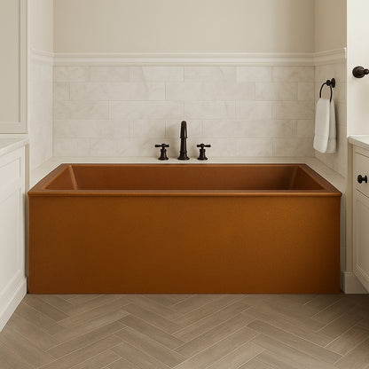 Rectangular drop-in copper bathtub with full apron front installed in a bathroom alcove