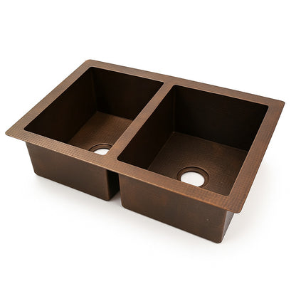 Custom made drop in undermount double bowl copper kitchen sink with a wide flange, side view