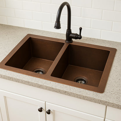 Custom made drop in undermount double bowl copper sink in a kitchen