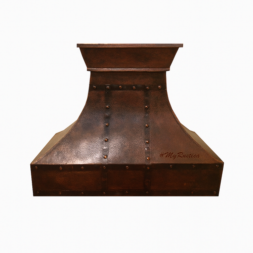 Copper range hood with rivet details on a white background