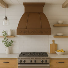 Hacienda copper range hood with grapevine apron design in a farmhouse style kitchen