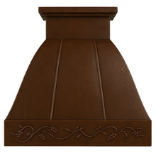 Hacienda copper range hood with grapevine apron design seen from the front