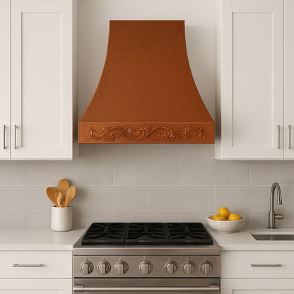 Hammered copper range hood with decorative apron in a modern style kitchen