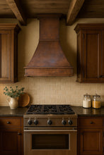 Mexican hacienda style smooth copper range hood 30-inch in a rustic kitchen