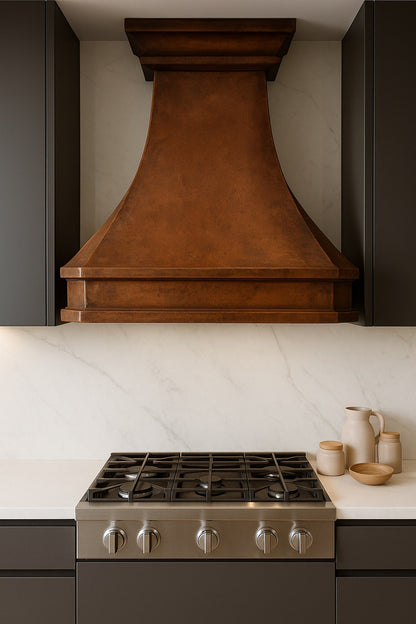 Contemporary style kitchen with an antique flared copper range hood with a stepped crown design