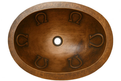 Custom oval copper drop in or undermount bathroom sink with horseshoe reliefs