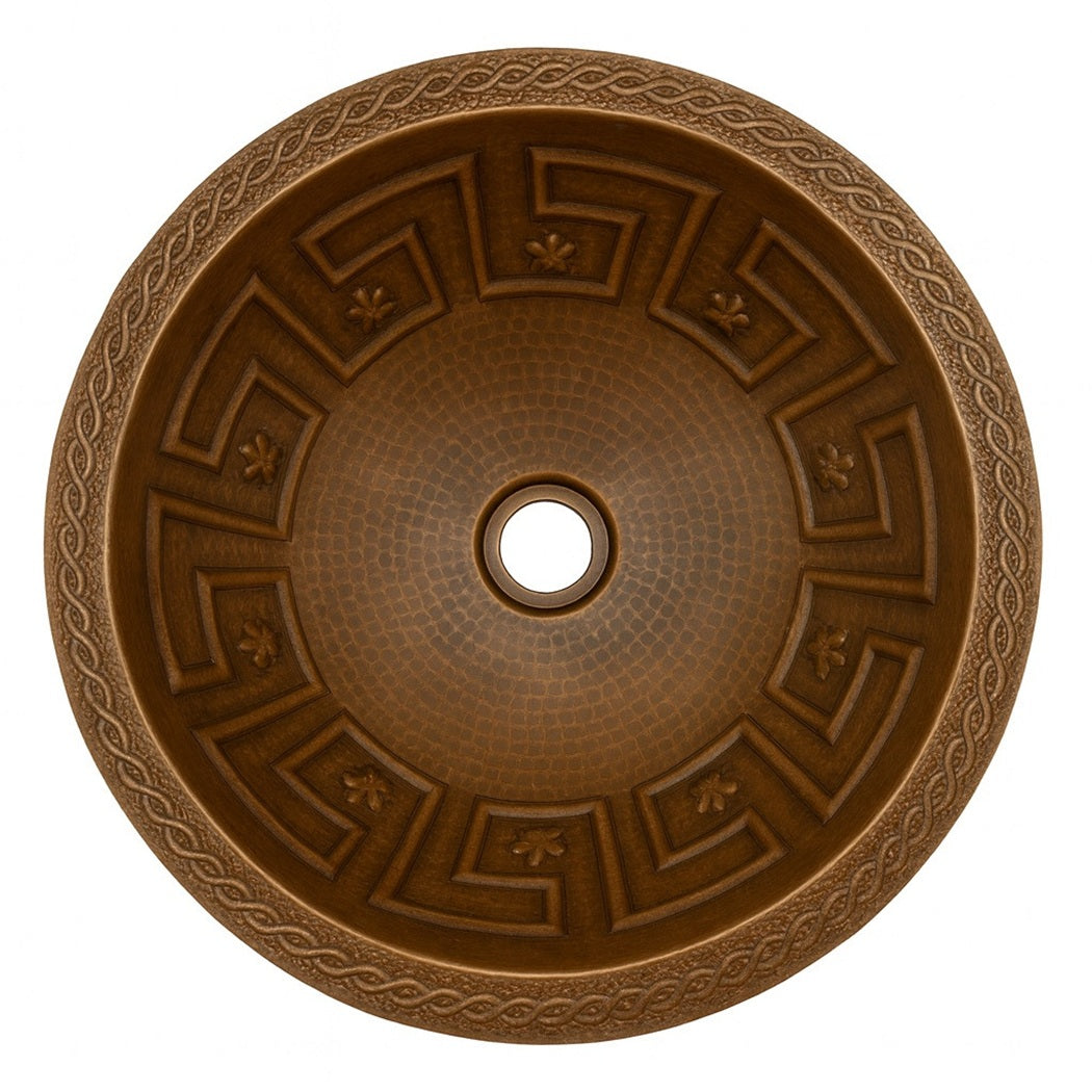 Custom round copper drop-in bathroom sink with Aztec design and braided rim