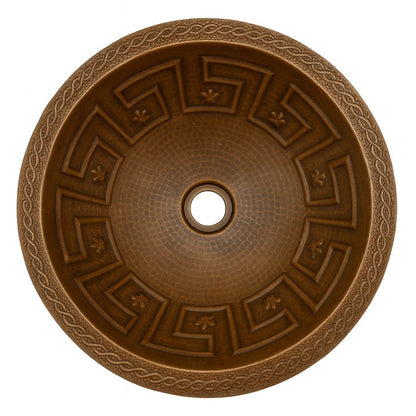 Custom round copper drop-in bathroom sink with Aztec design and braided rim