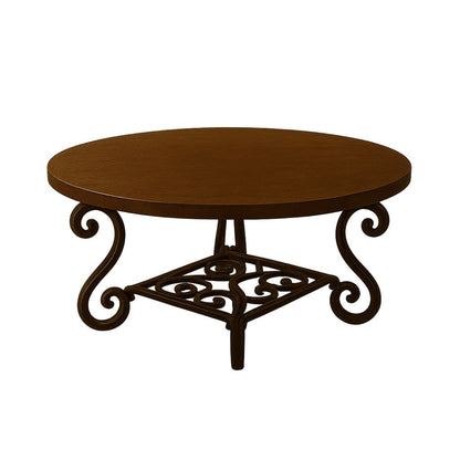 Round copper table with a curved scroll iron base and handcrafted top