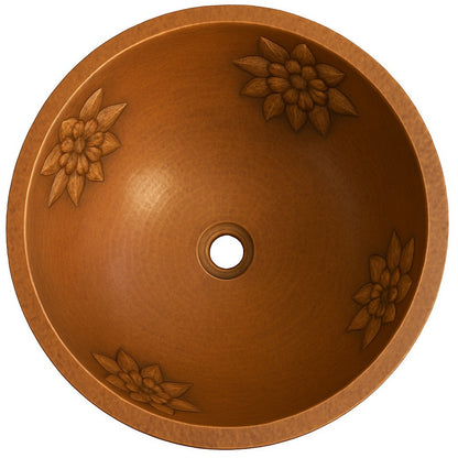 Round hammered copper bathroom sink with floral relief design