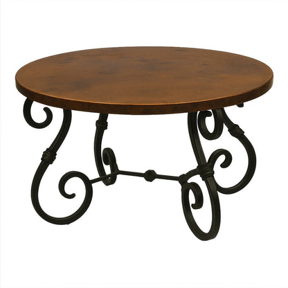 Round handcrafted copper table with Spanish Colonial iron stand, hammered top with warm patina and ornate forged base