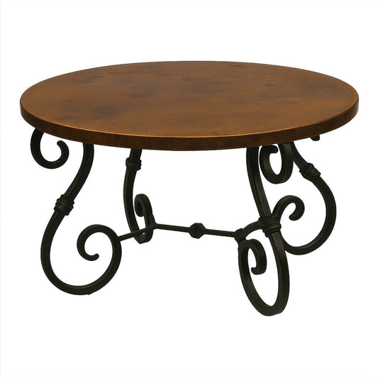 Round handcrafted copper table with Spanish Colonial iron stand, hammered top with warm patina and ornate forged base