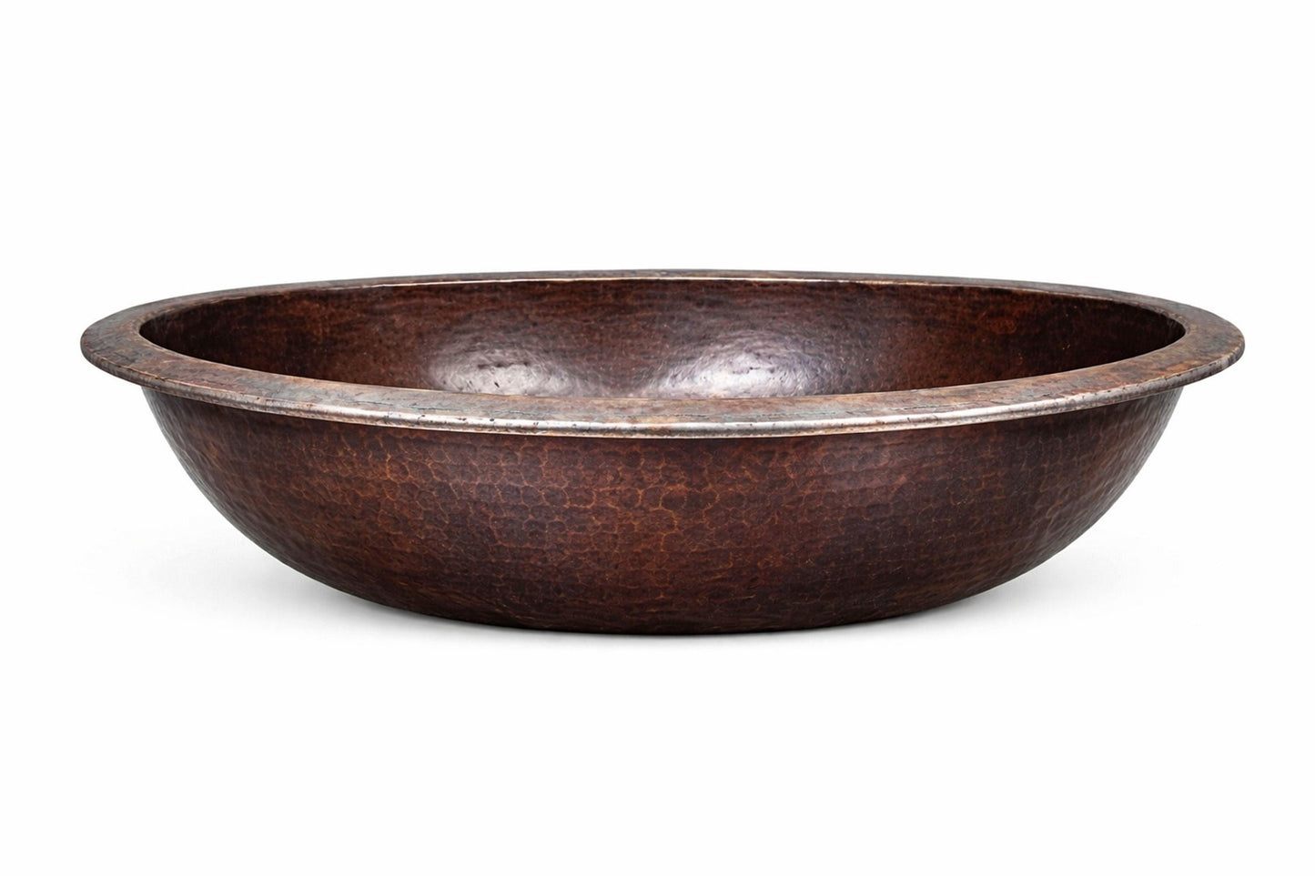 Side view of a small oval copper bathroom sink with hammered finish