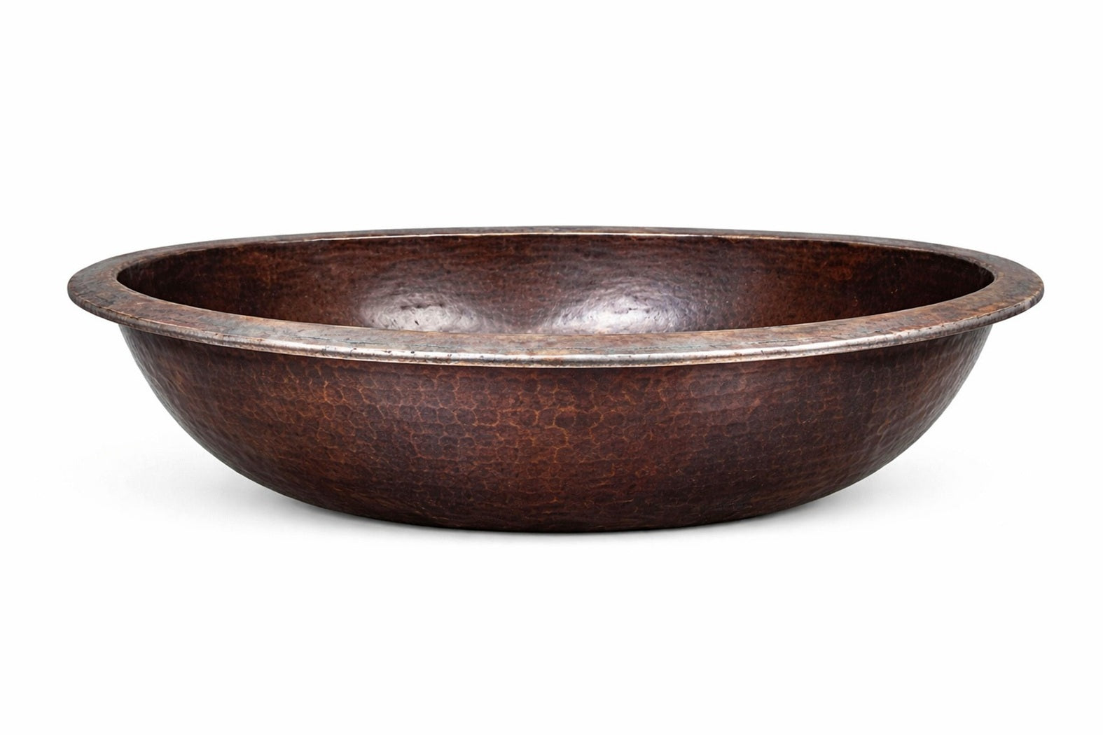 Side view of a small oval copper bathroom sink with hammered finish