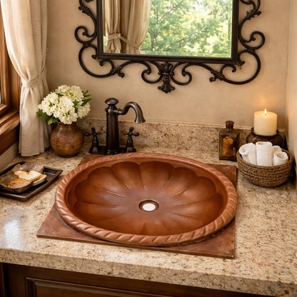 Small custom oval copper drop-in  undermount bathroom sink with scalloped basin and rope rim