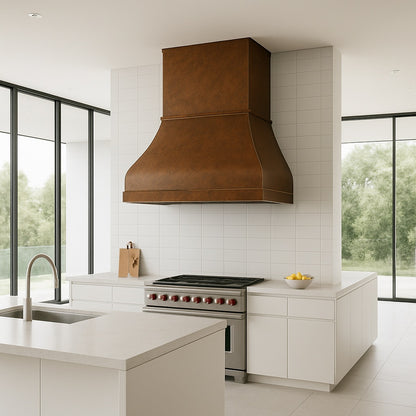 Handcrafted soft hammered copper range hood design in a contemporary kitchen