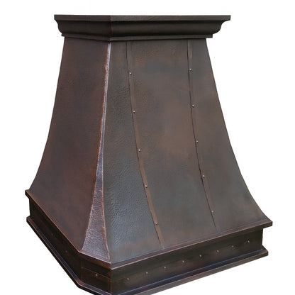 Vintage copper range hood with a tapered body, side view