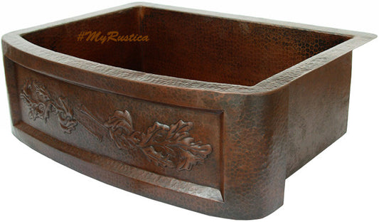 hand hammered apron design of the kitchen sink made of copper