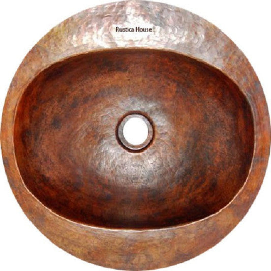 Custom round copper bathroom sink with burnished basin and wide rim for drop-in or undermount use